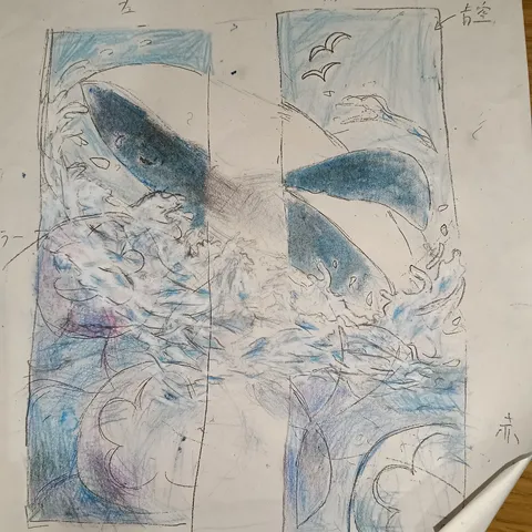 クジラと青い波しぶき