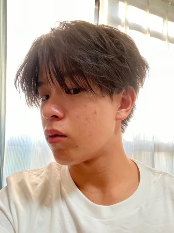 光と影、少年の横顔