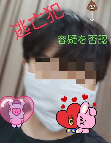 顔を隠した逃亡犯？