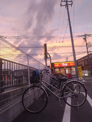 夕暮れ空と自転車の詩