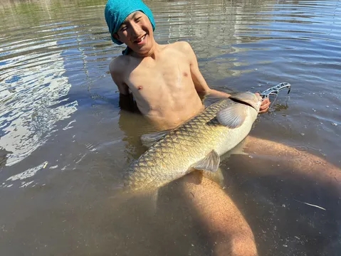 満面の笑みと大きな魚