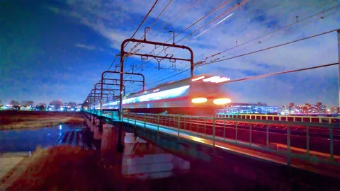 夜空を駆ける光の列車