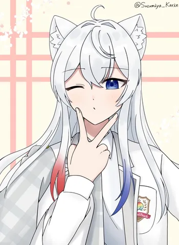 招き猫ポーズでカメラ目線