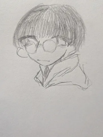 丸メガネと寝癖？