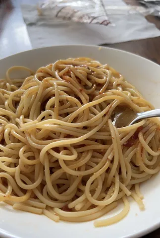 フォークに絡まる麺たち