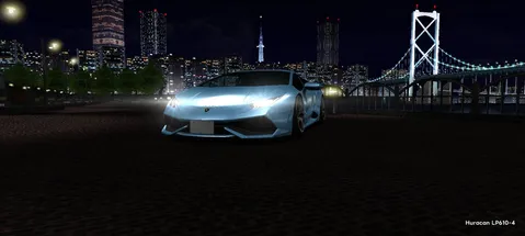 都会の夜景に輝くクールな車