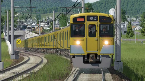 新緑を駆ける黄色い鉄道