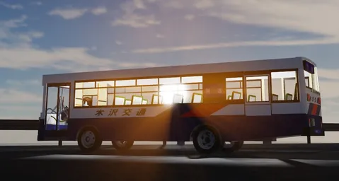 陽光を纏うバスの横顔