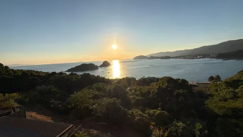 沈む光と海の静景